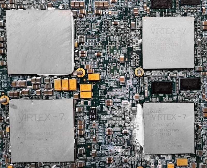 LOT OF 36 XILINX VIRTEX 7 CHIPS FOR SALVAGE ON 9 BOARDS